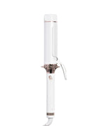 White hair curling iron with rose gold accents on a white background