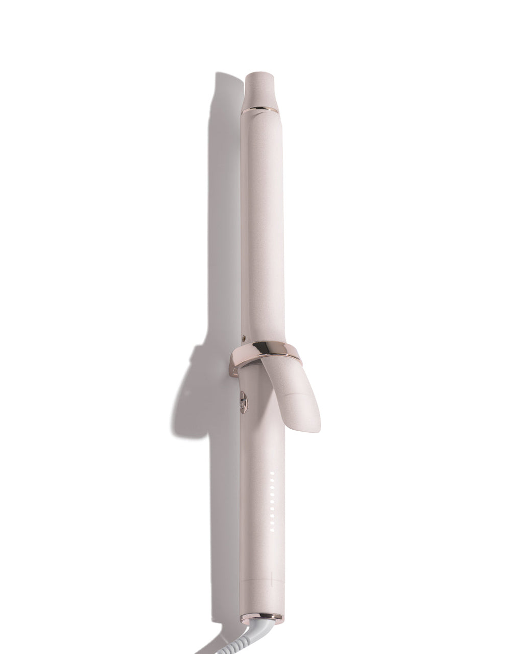 Pink hair curler on a white background