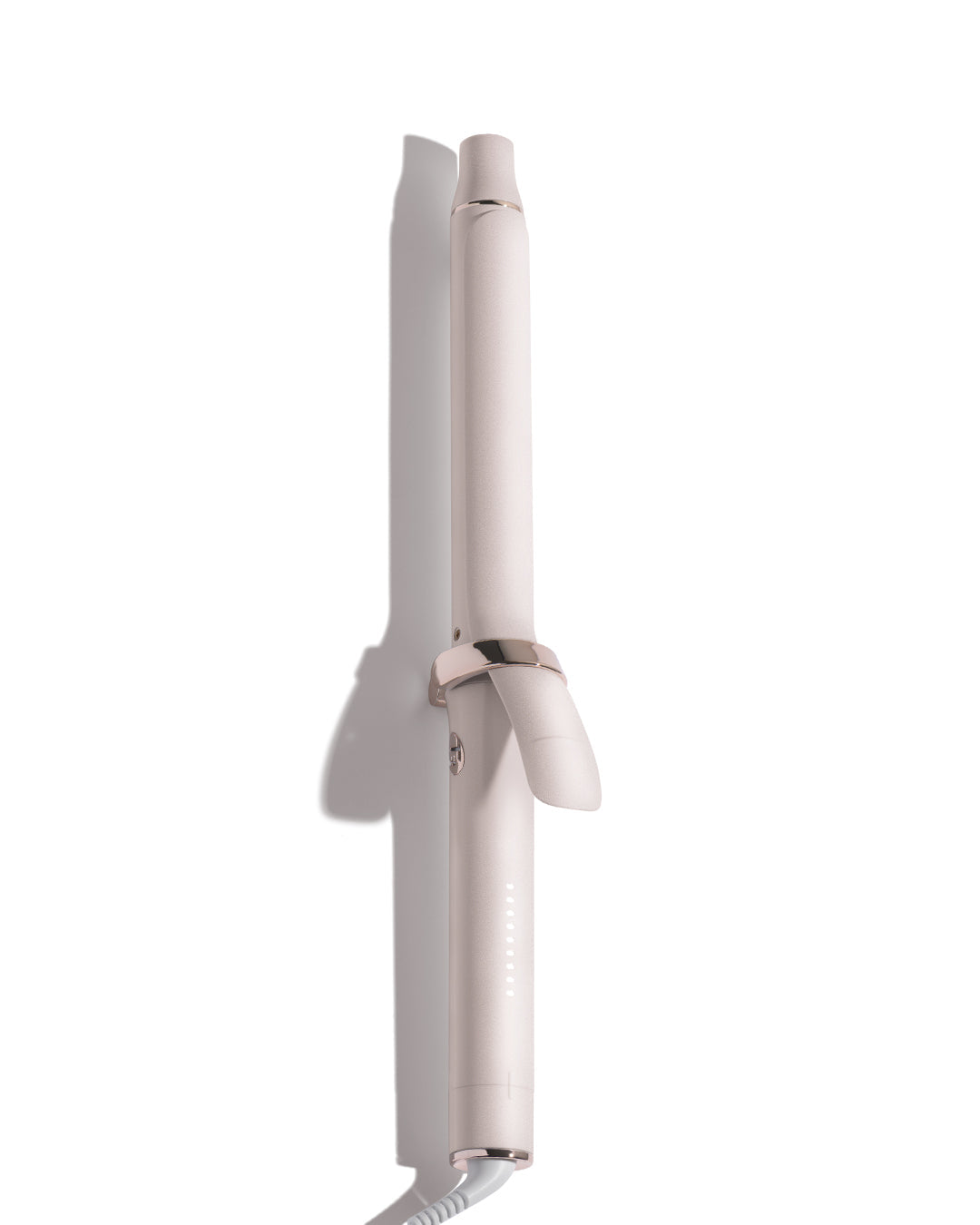 Pink hair curler on a white background
