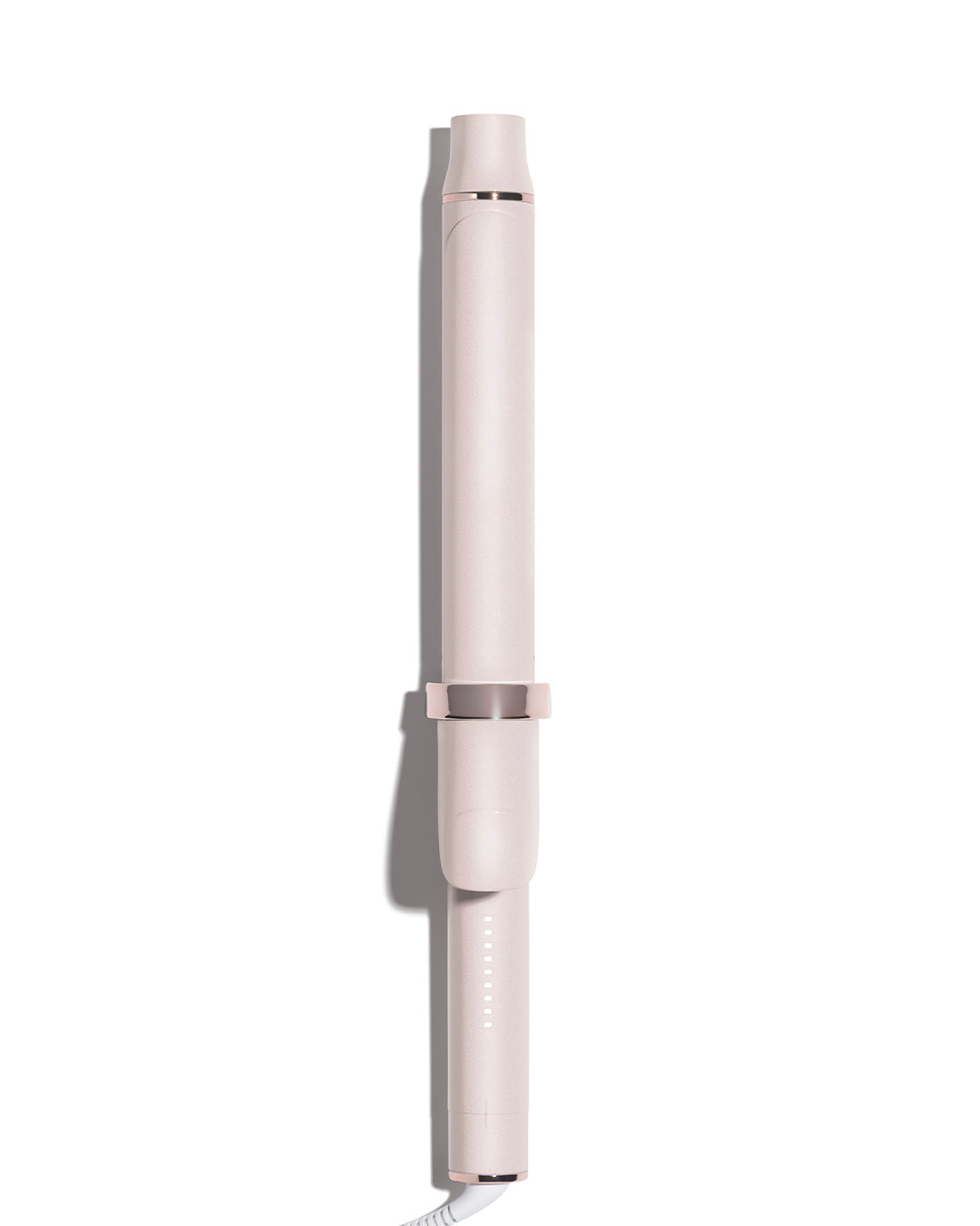 Pink hair curling iron on a white background  